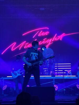 Royce performing with The Midnight.jpg